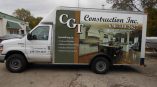 Partial van wrap for CGT Construction Inc featuring kitchen and home improvement graphics on the side.