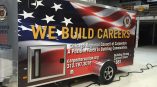Full trailer wrap for the Chicago Regional Council of Carpenters with patriotic graphics and bold text.