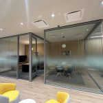 3M Fasara frosted glass film installed on showroom windows at a new Kia dealership in Chicagoland.