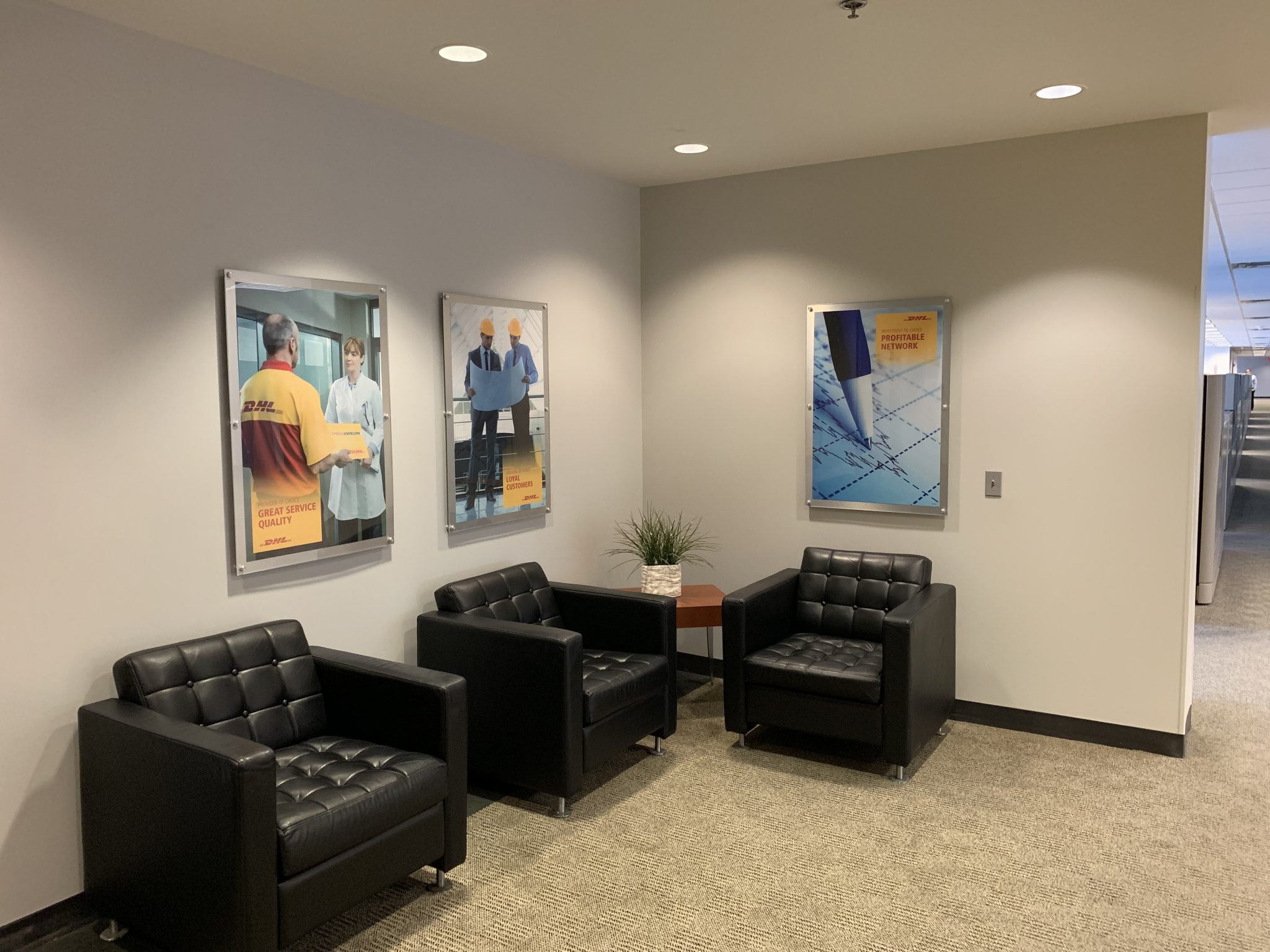 Branded corporate office foyer with custom wall graphics installed by SpeedPro Windy City