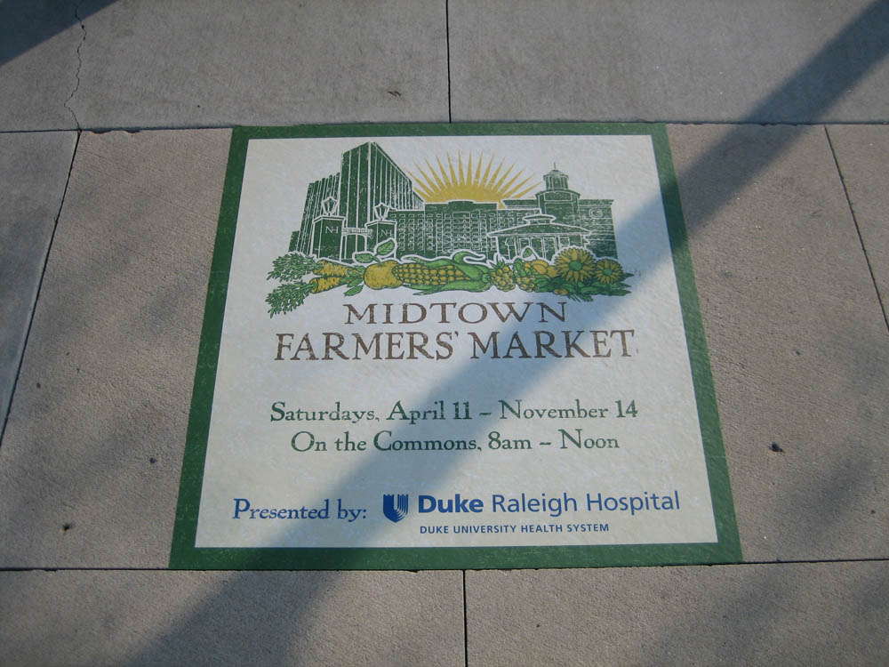 Midtown Farmers Market sign on a wall 2