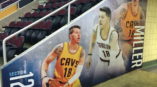 Graphic of Mike Miller at tunnel entrance of the Q Arena