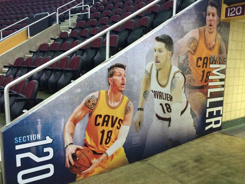 Graphic of Mike Miller at tunnel entrance of the Q Arena