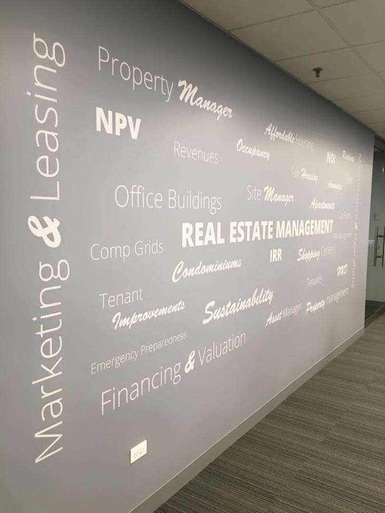 Real estate management wall signage
