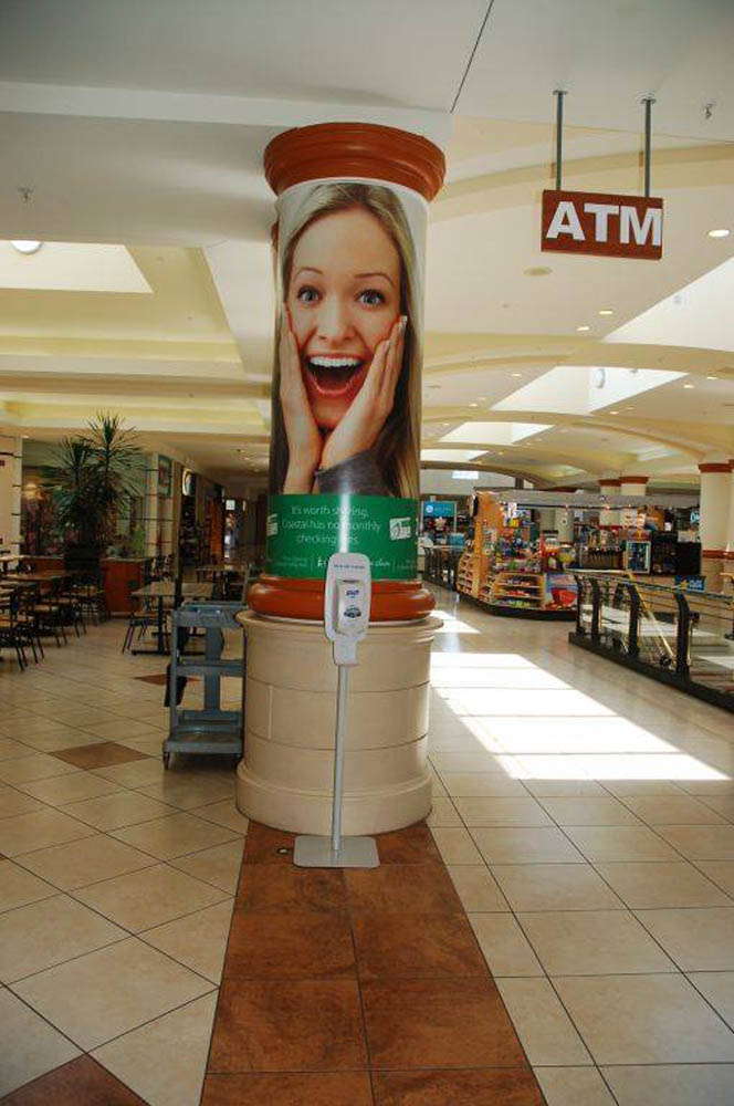 Retail advertisement on pillar in mall