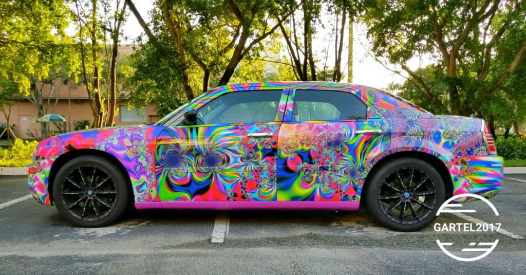 Multi-colored vehicle wrap on a Chrysler 300