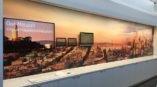 Digital signage with tvs overlooking a city