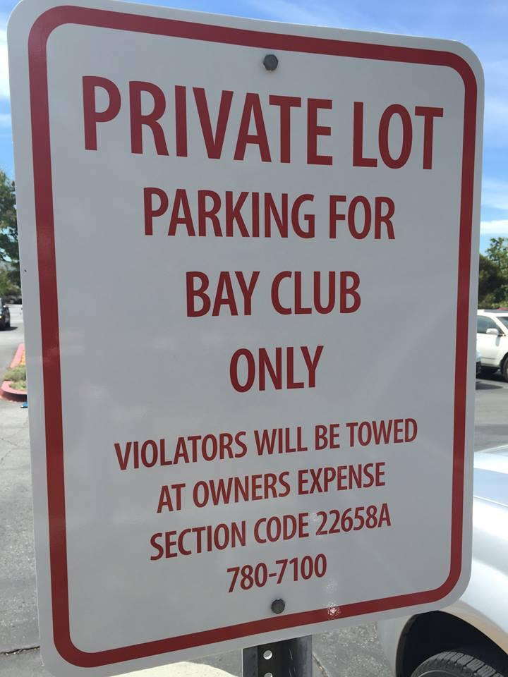 Signage for in front of parking space saying 