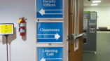 School signage for faculty offices learning cafe and classrooms