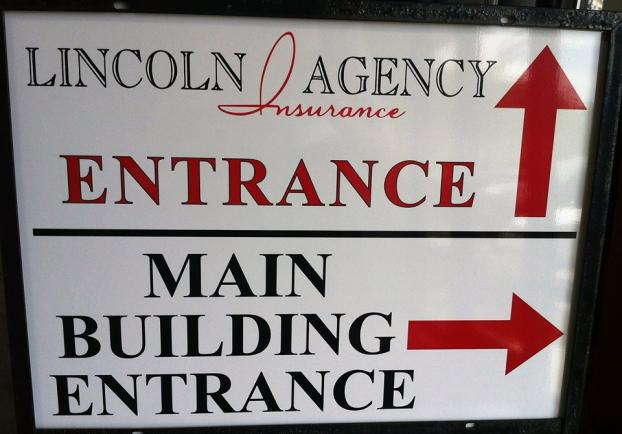 Lincoln Insurance Agency entrance and main building entrance signage