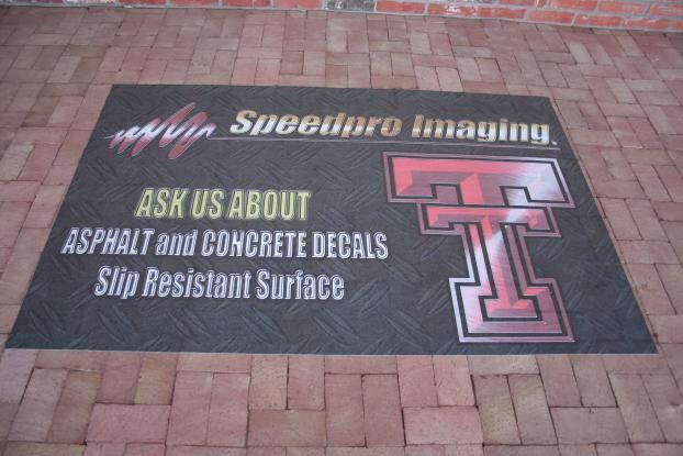 SpeedProw Imaging ask about asphalt and concrete decals floor graphic