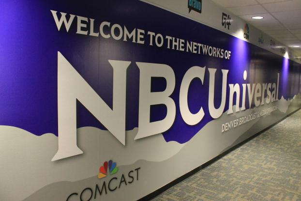 Wall sign saying Welcome To The Networks of NBC Universal Comcast