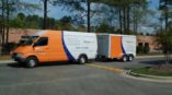 Orange purple and white van and trailer wrap