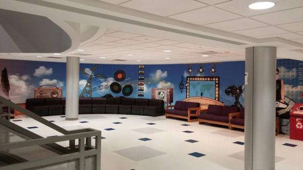 Wall mural of records televisions and radios
