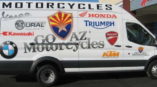Go AZ Motorcycles van with multiple motorcycle brands on it