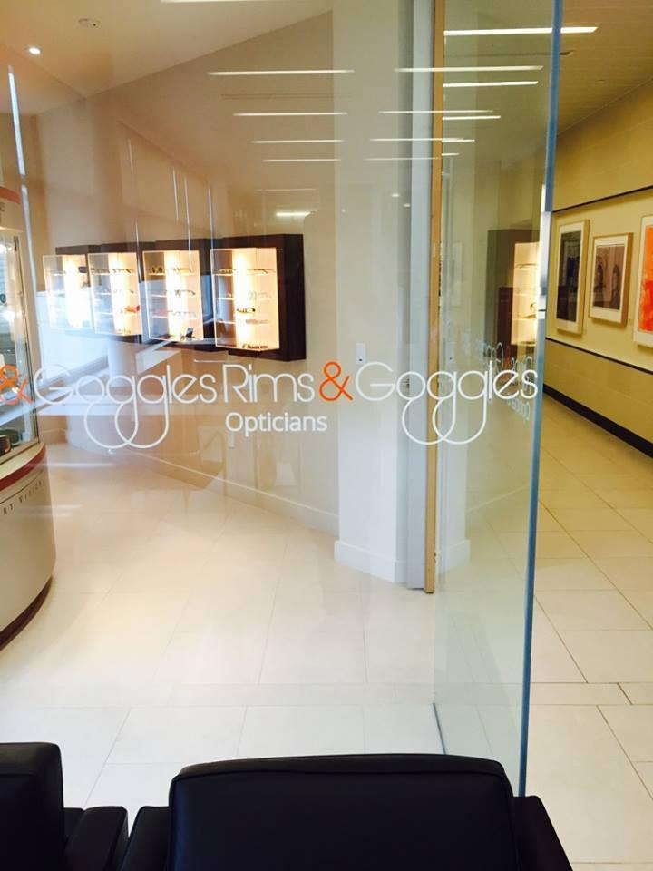 Rims & Goggles Opticians graphic on glass