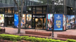 Multiple window graphic banners along the Unlock Tampa Bay Visitors Center