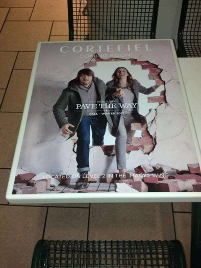 A tabletop graphic printed to announce a new store opening