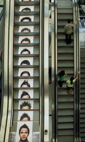 A branded escalator with physical marketing